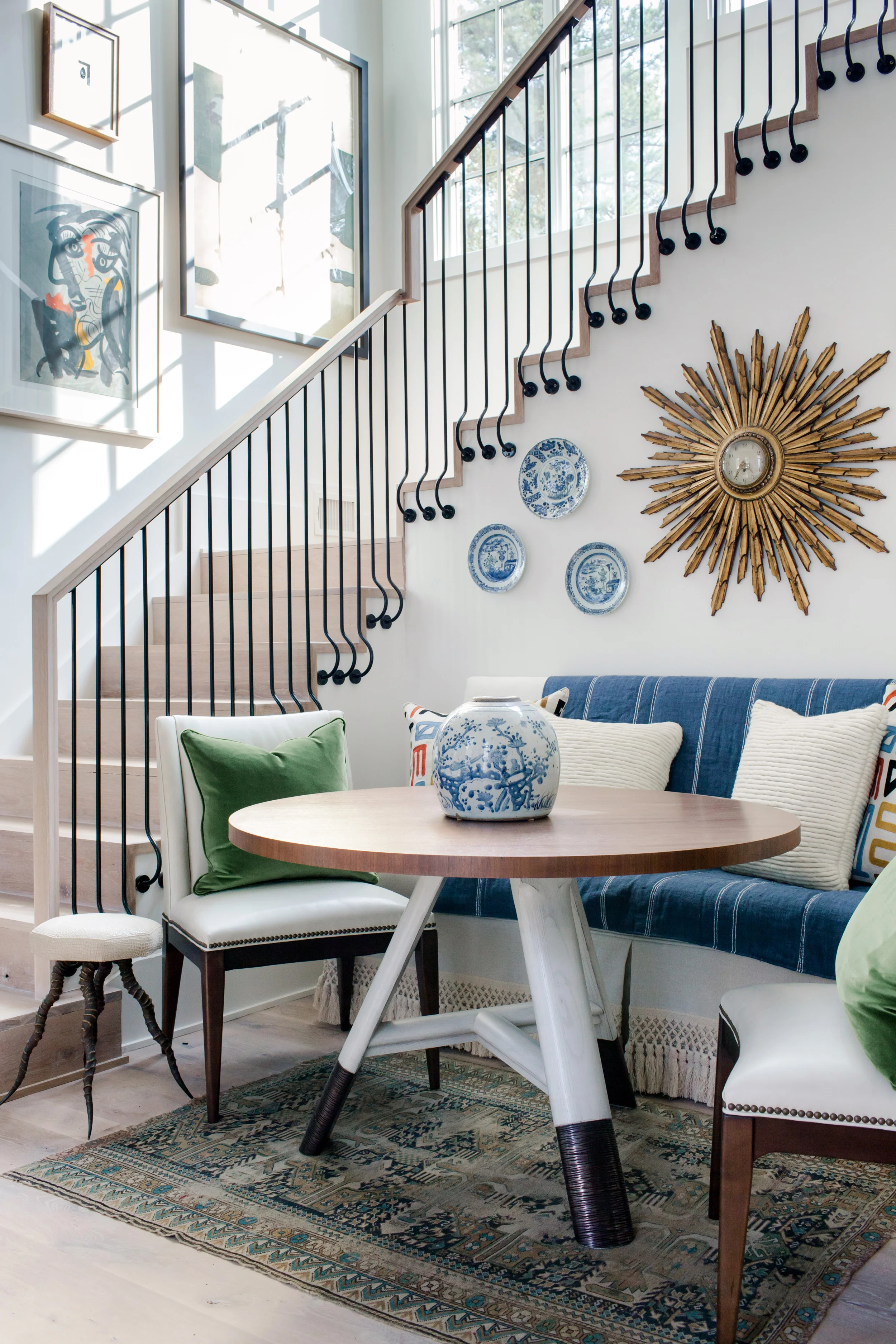 The stairs of The Manor Homes include custom steel work by Serenbe retailer Gault Designs. Photo by Ali Harper Photography .