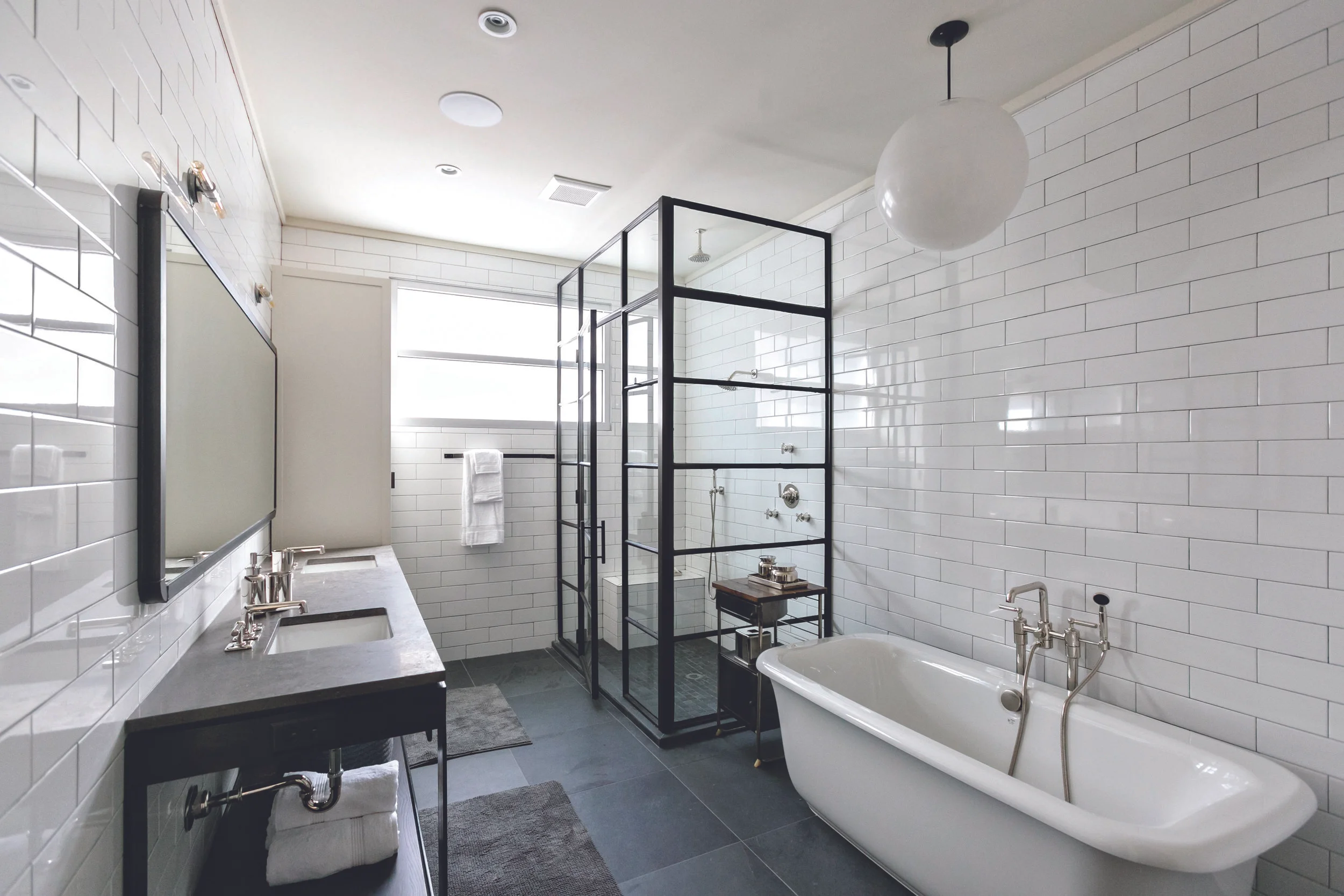The residential portion is a 3-bedroom, 2.5 bath “split level” floor plan with interiors by Smith Hanes Studio. Photo by J. Ashley Photography .