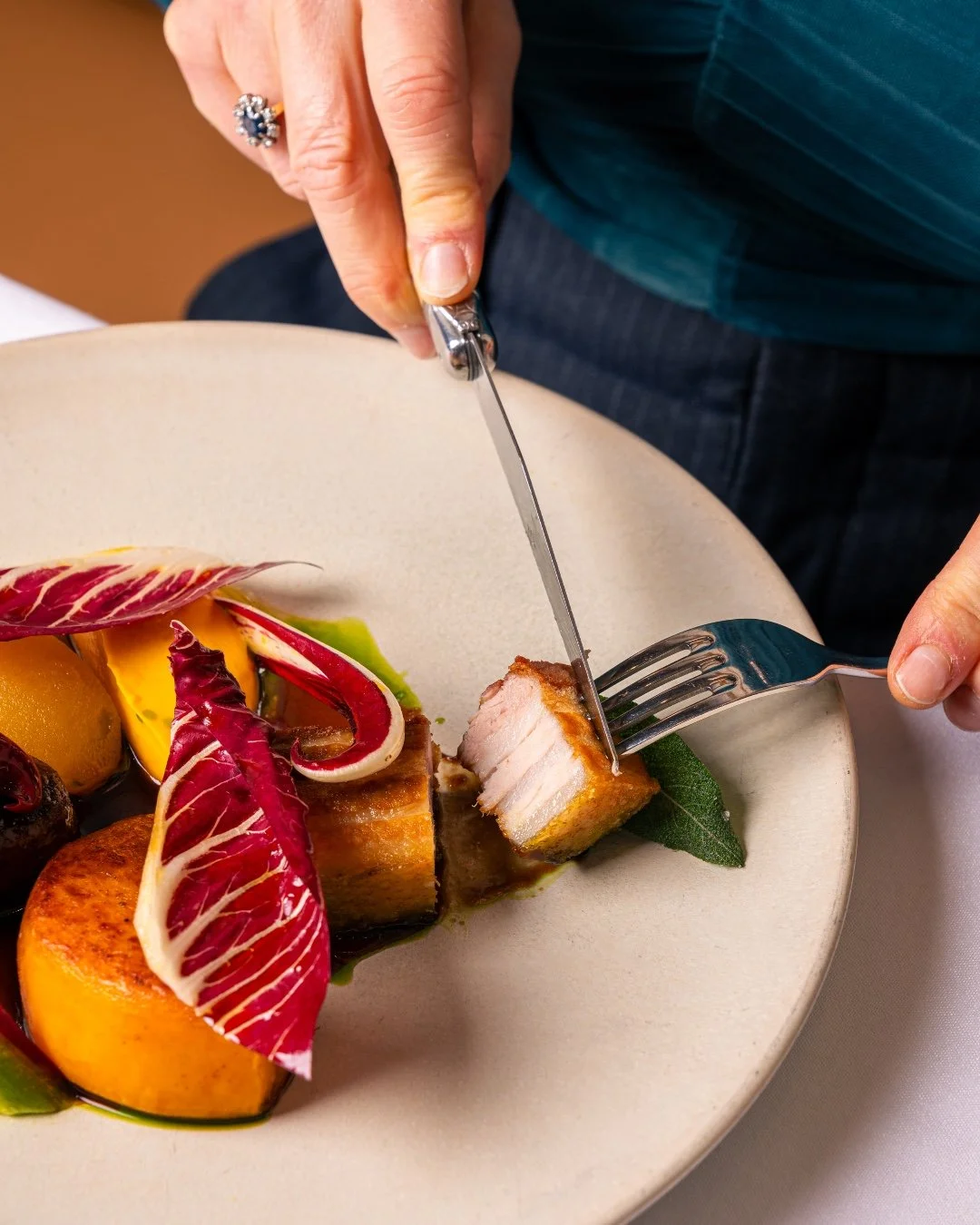 Roast Ib&eacute;rico pork served with heritage carrot, a potato and black pudding terrine, caramelised apple, salsa verde and calvados jus. A comforting mix of flavours we love, all brought together with care in the kitchen.

A dish made for slow mom