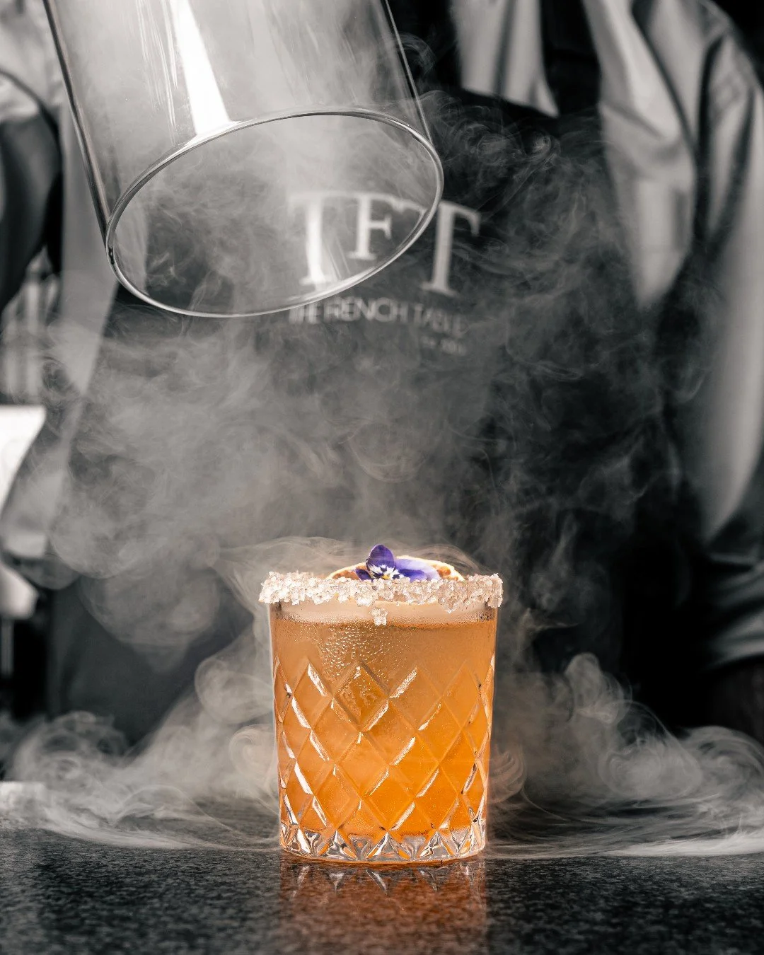 A little theatre at the table and an experience to be savoured from first glance to final sip.

Lift the cloche and the aroma unfolds: citrus, warmth, and a hint of sweetness beneath the smoke.

Elegant. Balanced. Crafted with precision.

Discover ou