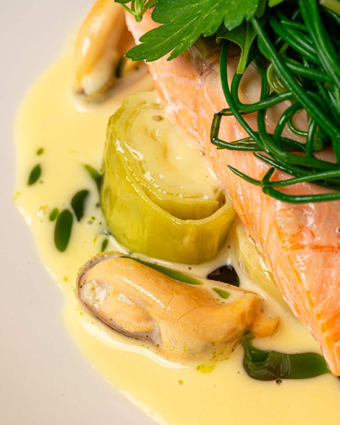 This is our steamed chalk stream trout, delicately prepared and layered with the freshness of the season.

Leeks, pink fir potatoes and St Austell mussels, brought together with a silky beurre blanc and finished with herbs from the garden.