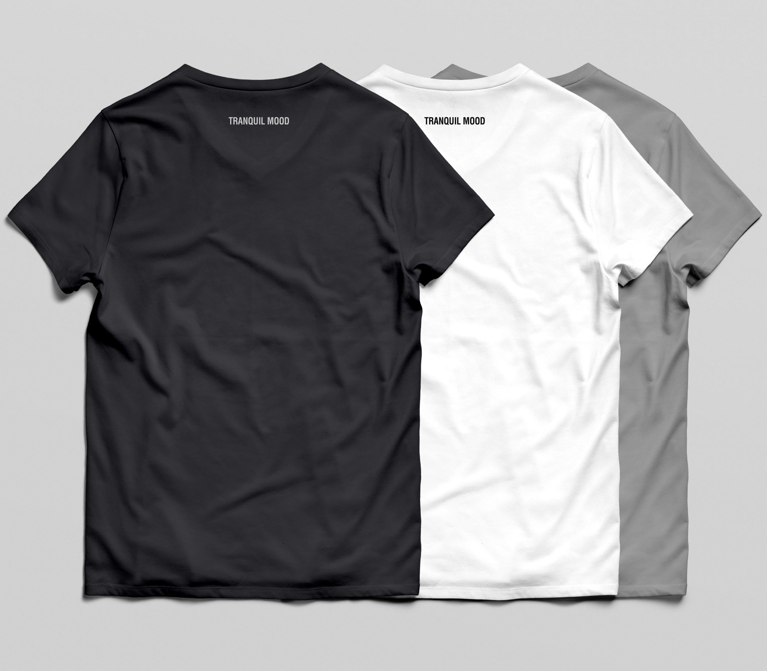 TM shirts three back.png
