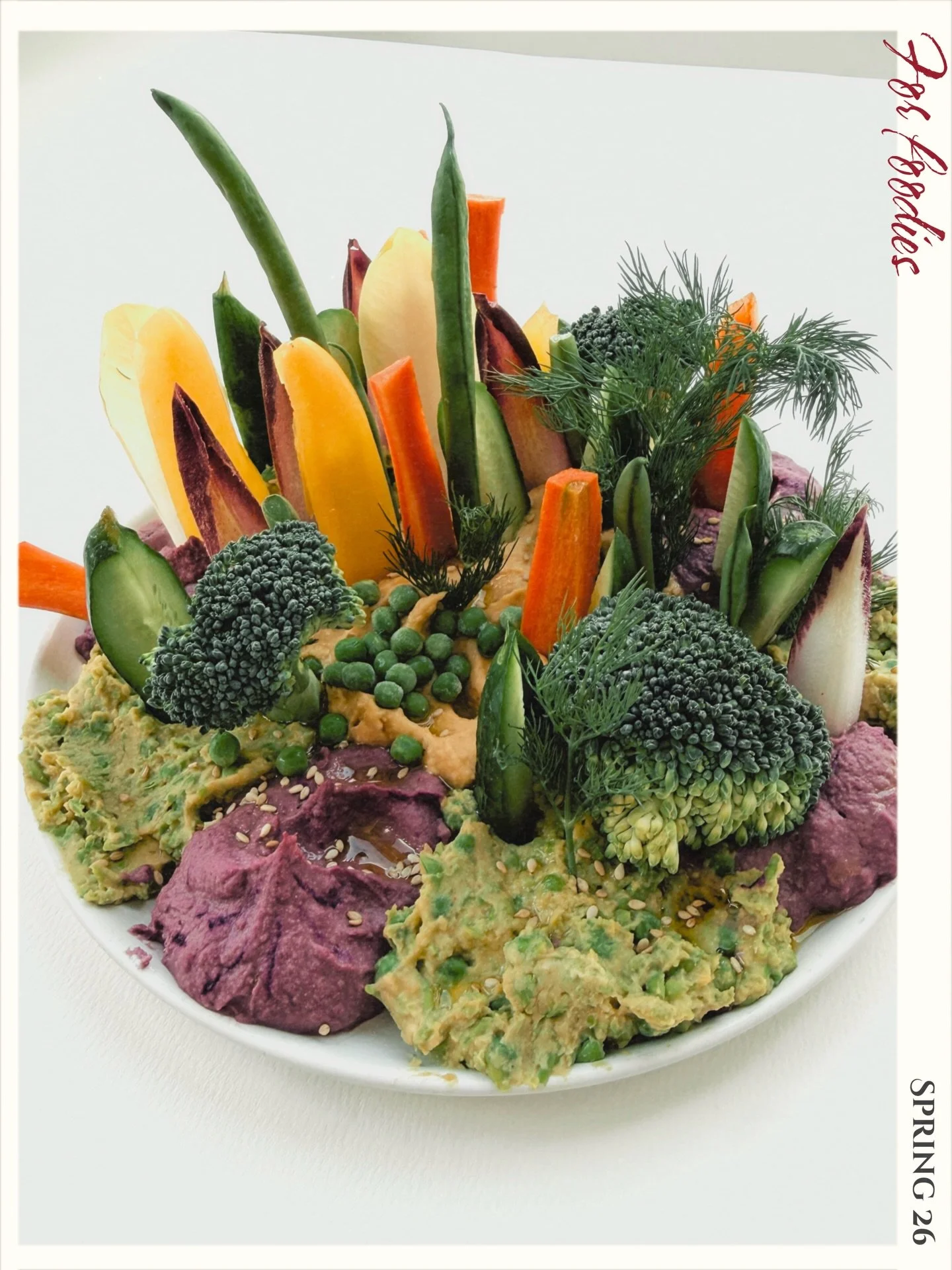 This season I keep coming back to vegetables &mdash; colorful, fresh, and full of life. When you start arranging them, they almost begin to look like a little garden growing from the plate.

Carrots, cucumbers, broccoli, radishes, peas and herbs stan