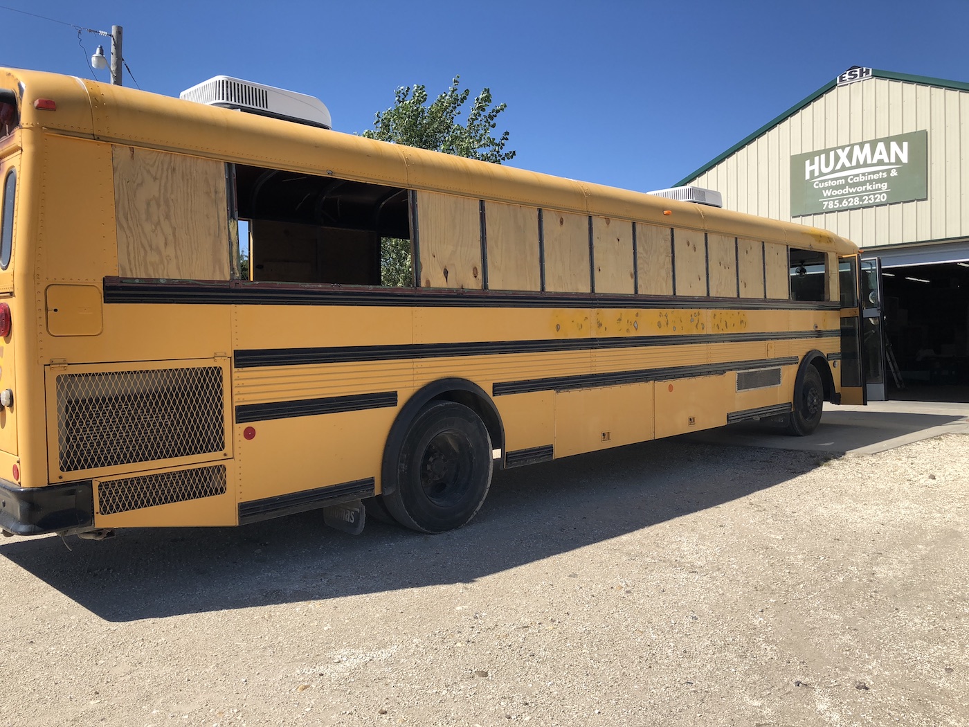1_WideWonderBus_SkoolieRenovation_windowremoval.jpg