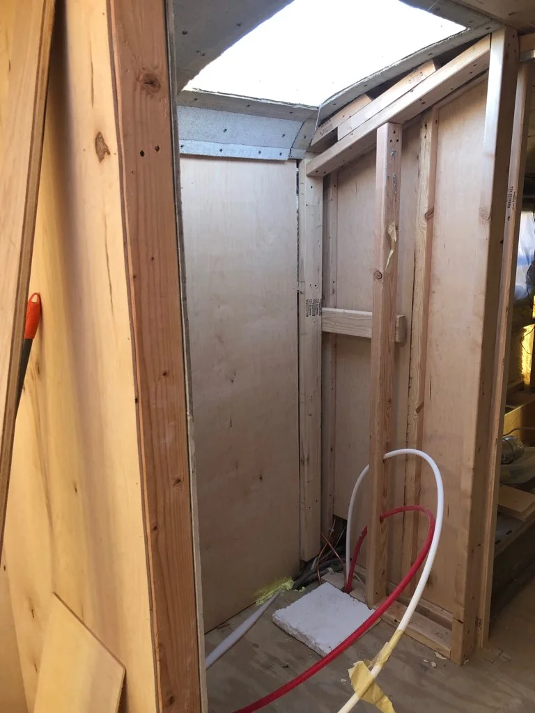 4_WideWonderBus_SkoolieRenovation_bathroom.jpg