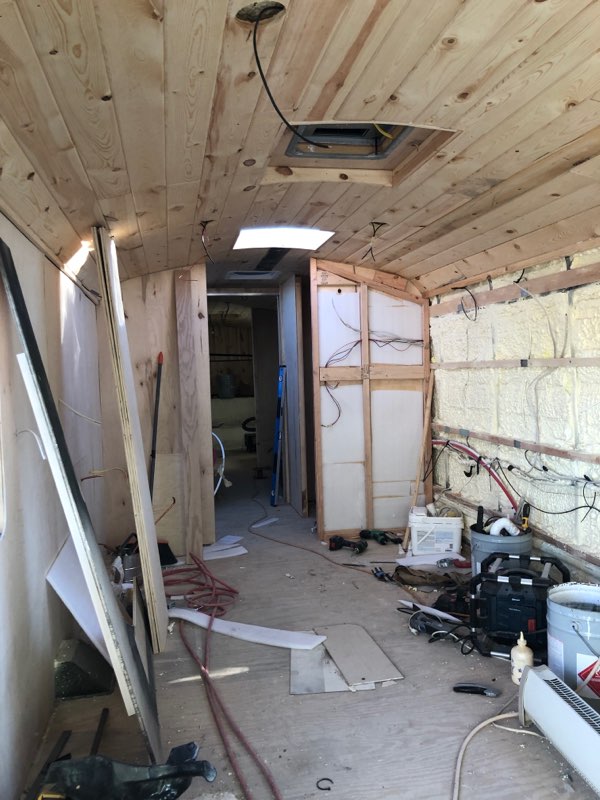 4_WideWonderBus_SkoolieRenovation_walls.jpg