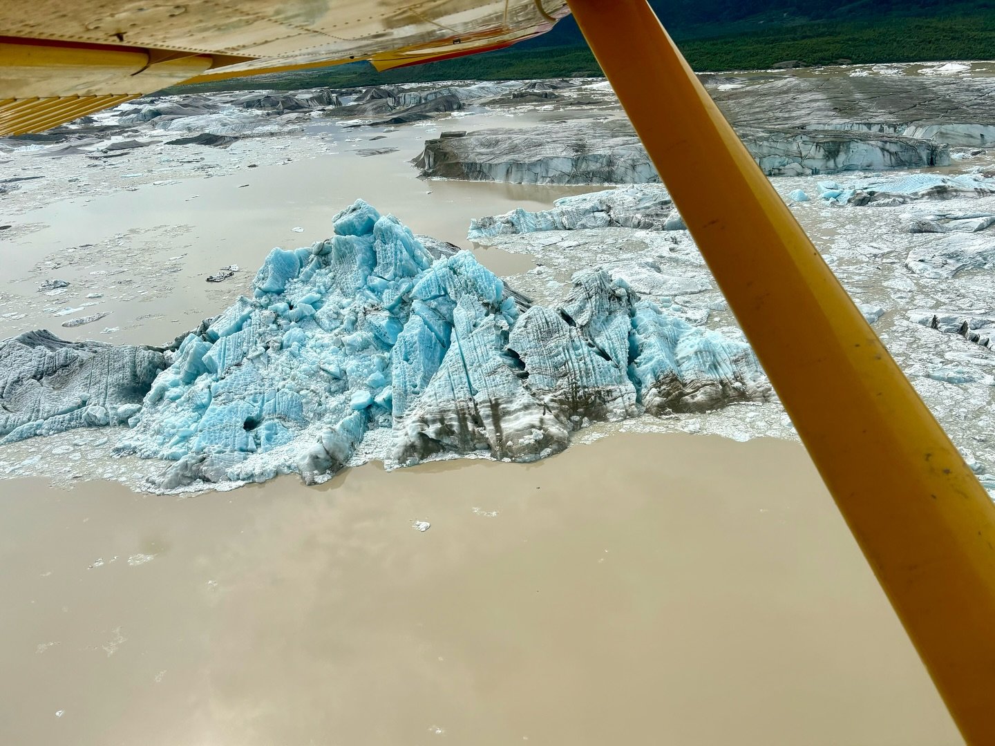 It&rsquo;s been a great summer for fresh ice! This iceberg rolled to expose solid blue ice just before landing at Doubtful Creek - a moment that even our pilot had to get out and take in the scenery! Doubtful Creek is an excellent spot for packraftin