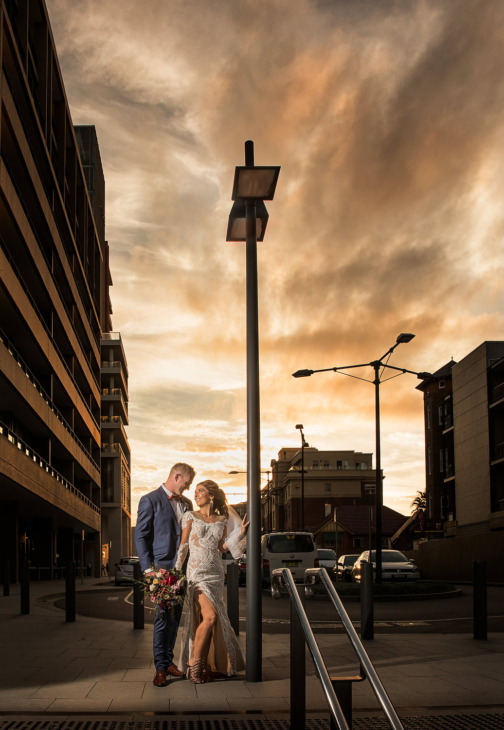 Merewether Surfhouse wedding photographer couple in the sunset with designer dress 