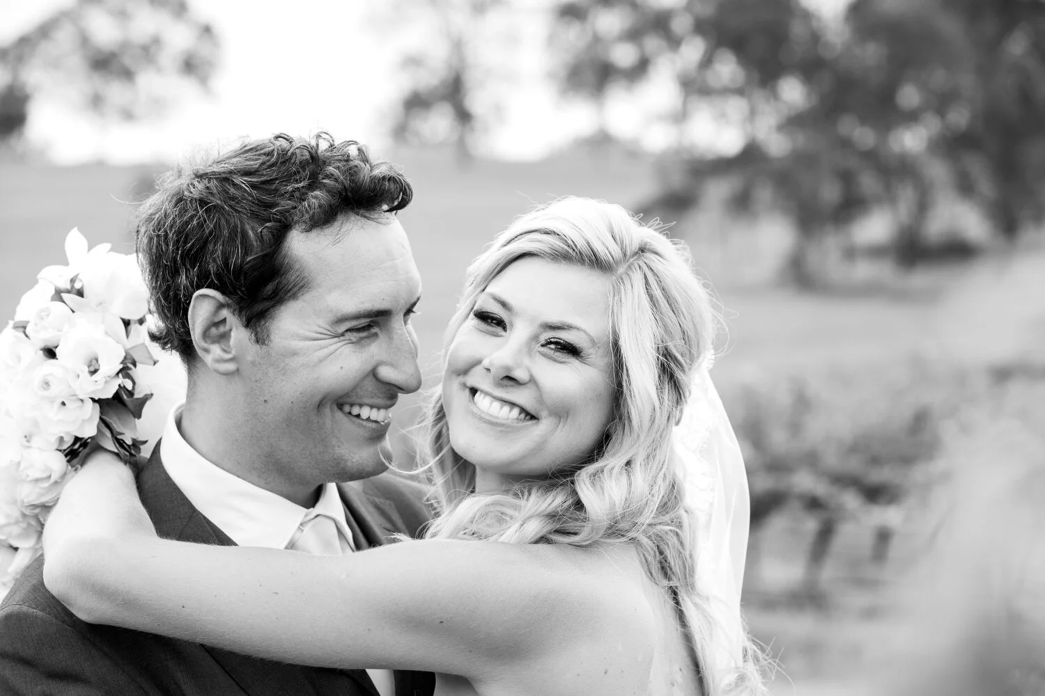 Relaxed Hunter Valley newlyweds smiling together