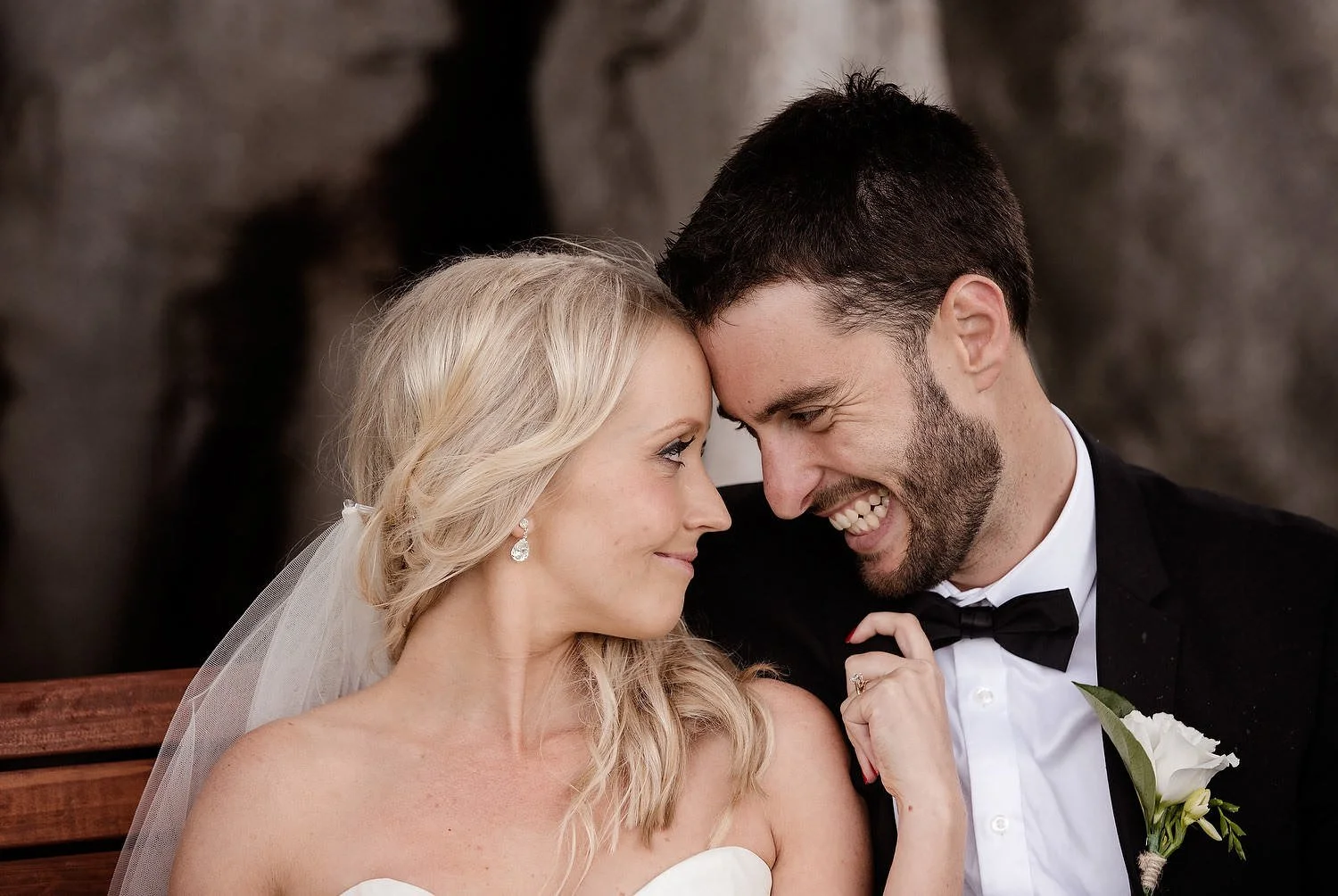 Newlyweds sharing a candid close moment