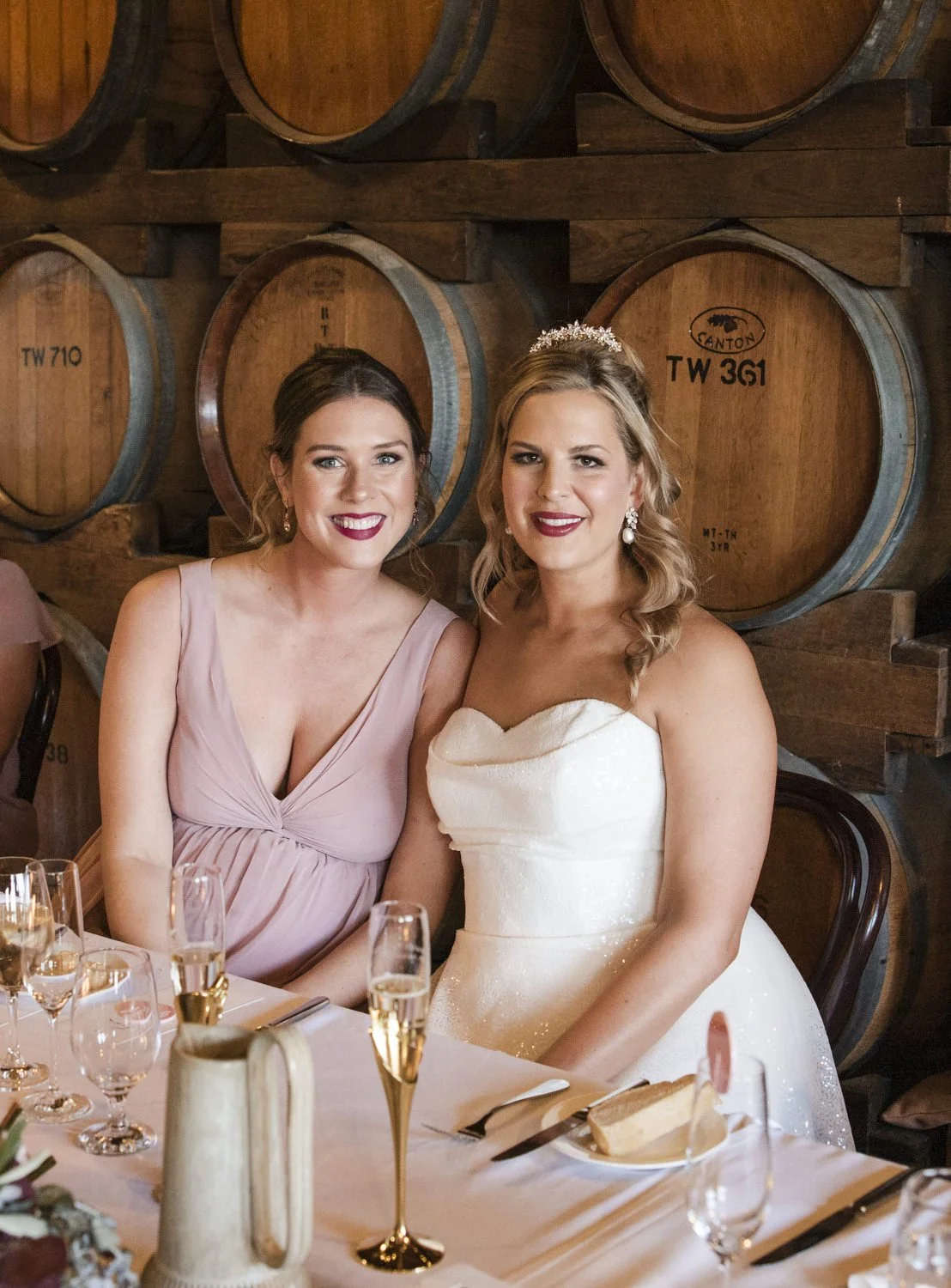 bride and bridesmaid in reception at Peppers Creek Barrel Room  