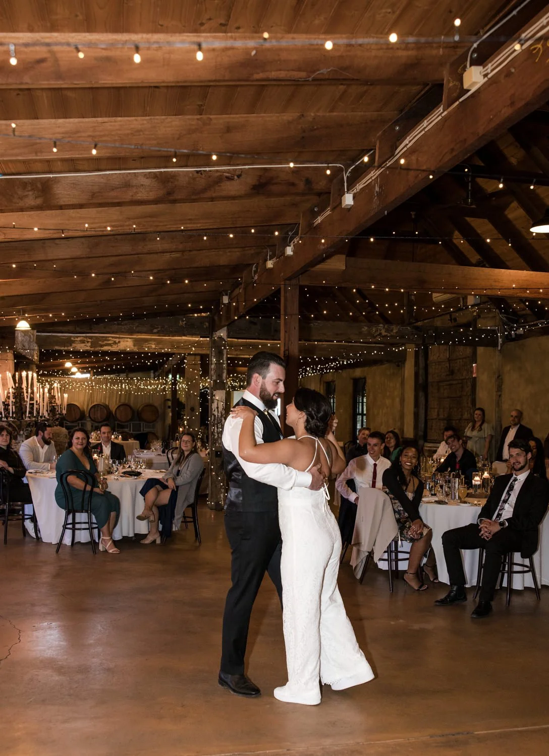 Bride and Groom dancing bridal waltz in Peppers Creek Barrel Room  Hunter Valley 