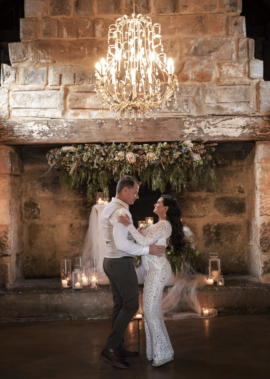 Bride and Groom dancing under chandalier at Peppers Creek Barrel Room  bridal dance  