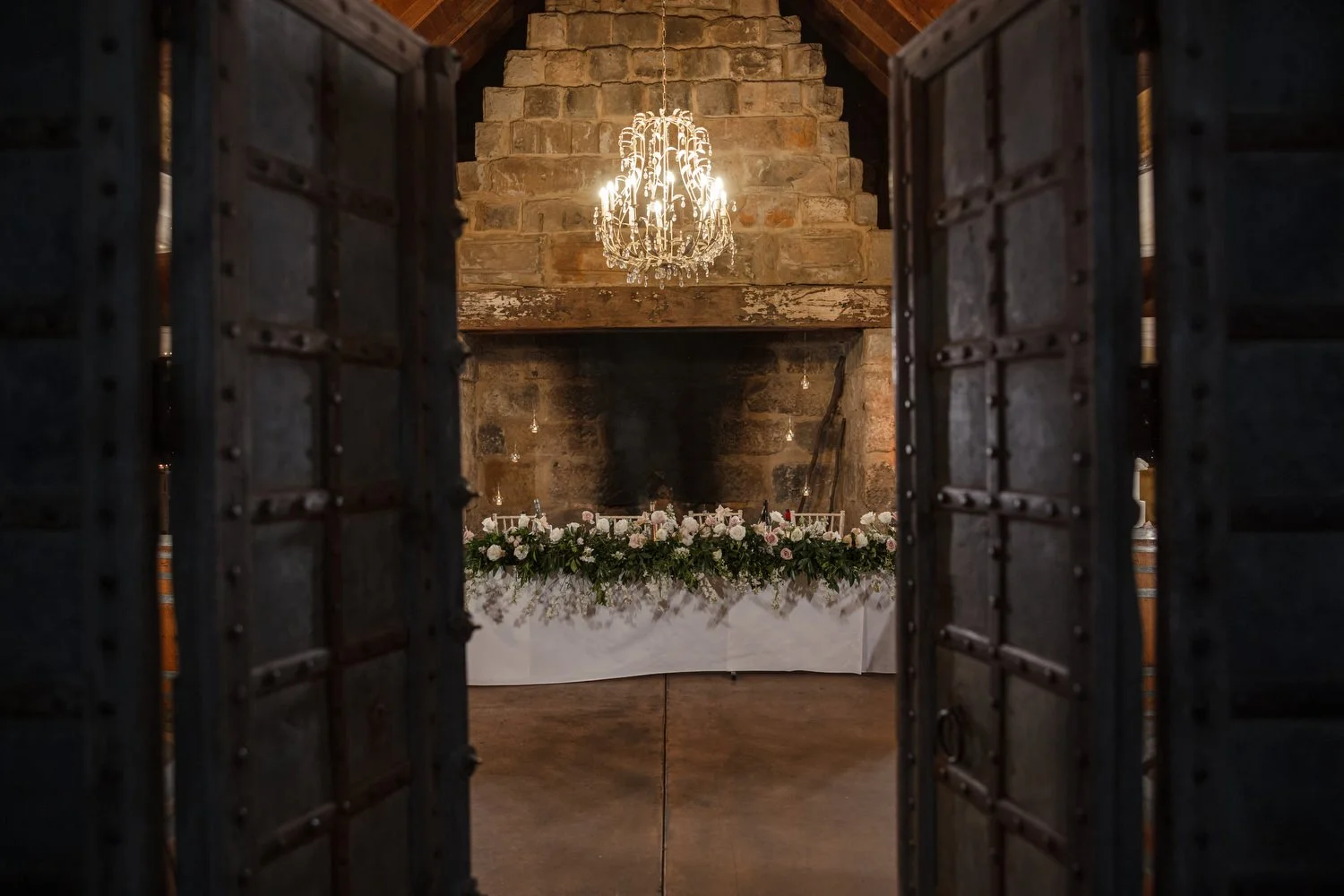 looking through doors at  Peppers Creek Barrel Room  