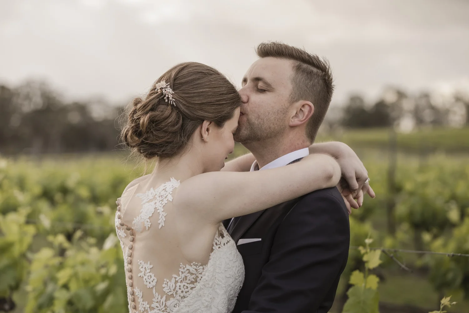 Hunter Valley couple photographed in soft vineyard light