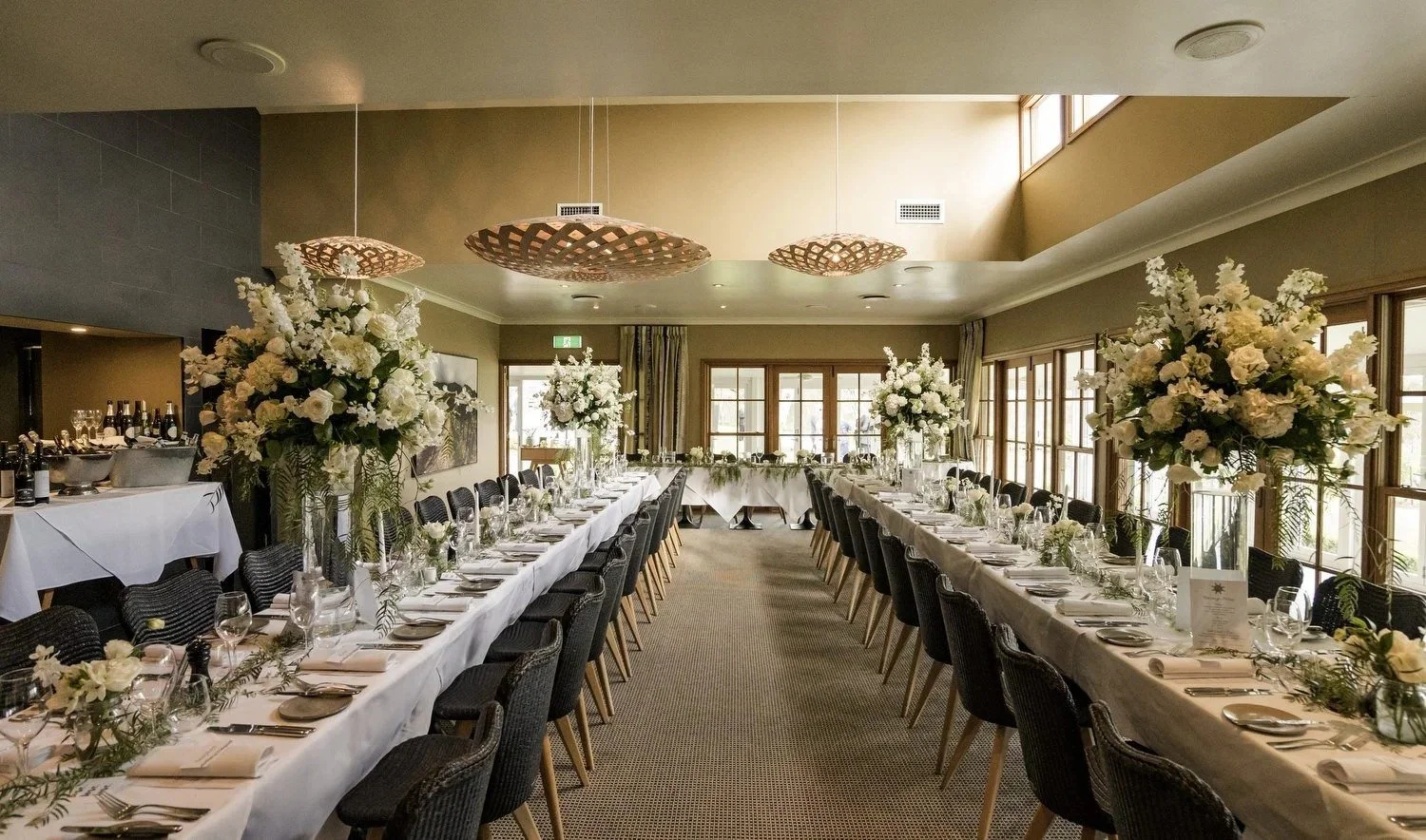 Restaurant Botanica set with long tables and white floral centrepieces, Spicers Vineyards Estate, Pokolbin