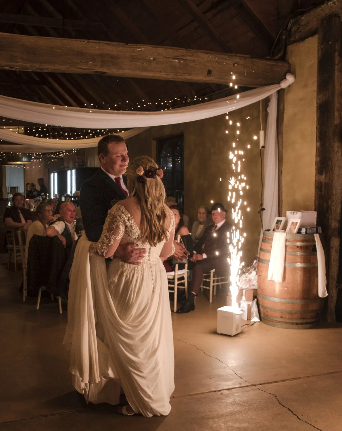 Bride and father dancing at wedding venue Peppers Creek Barrel Room  with sparklers