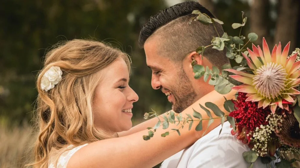 Bride and groom smiling naturally during a Newcastle wedding
