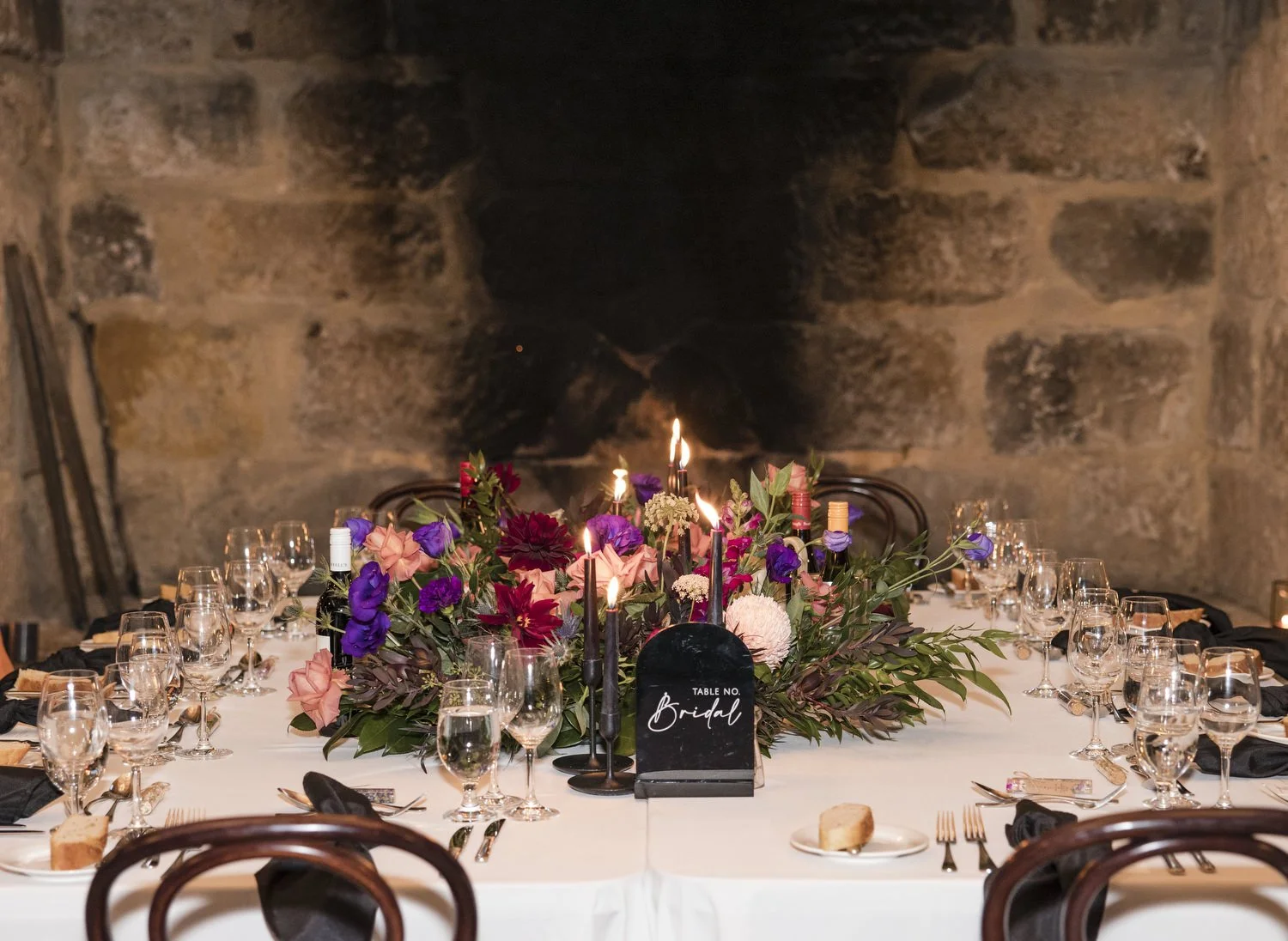 wedding Peppers Creek Barrel Room  Hunter Valley table setups in fire place 