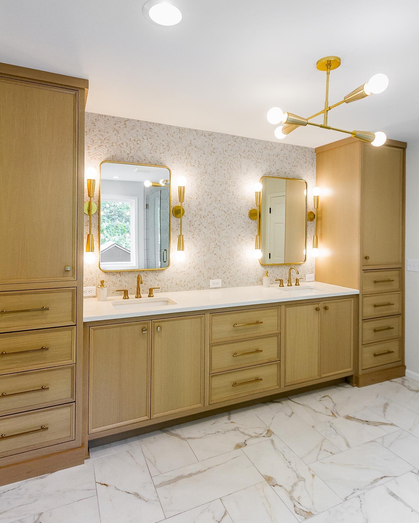 We completed this master bathroom remodel earlier this year. Can&rsquo;t get enough of the white oak cabinetry and gold hardware &amp; light fixture accents. As always, @marciknoffinteriors design made our jobs easy!
&bull;
&bull;
&bull;
@parkscabine