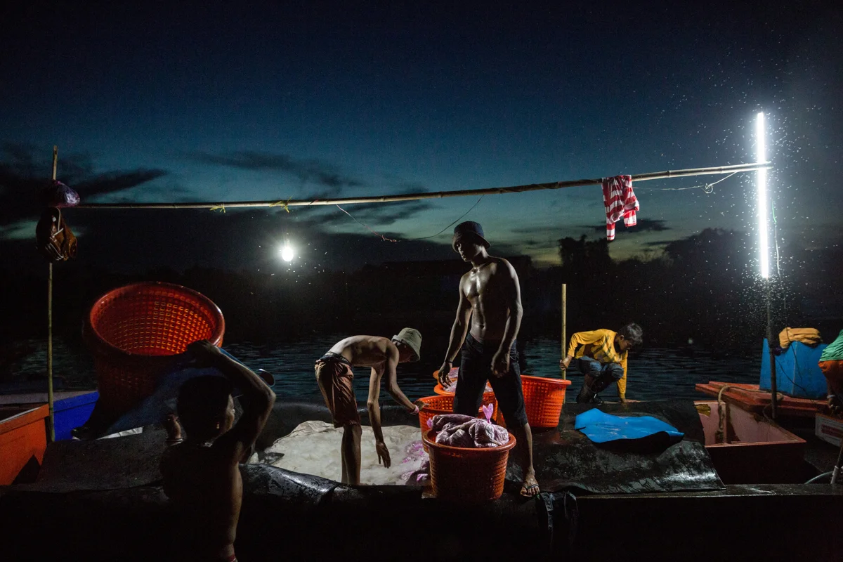  Nov. 21, 2016 -  Kampong Loung, Cambodia. Fish are unloaded into a waiting truck to be taken to whole-sellers in Phnom Penh. � Nicolas Axelrod / Ruom 