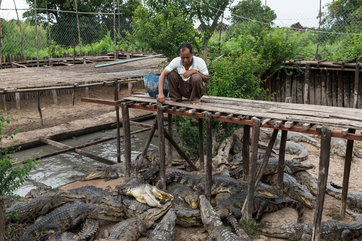 March 29, 2017 - Prek Tol, Cambodia. Ly Heng (46), owns a small floating general store and a crocodile farm. He often loans goods to families who cannot afford to pay, complaining that the people in his village are getting more indebted. © Nicolas Axelrod / Ruom