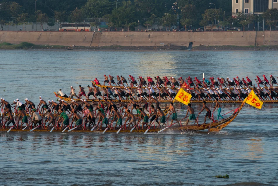 A racing boat coach encourages his teams before their race. Cambodia’s annual 3-day water festival celebrates the reversal of the flow of the Tonle Sap River - an event of large cultural significance because of the river’s role in national fishing and agriculture. The event was cancelled for three previous years in a row after the stampede incident in 2010, when nearly 350 people were killed and roughly 750 more were injured.