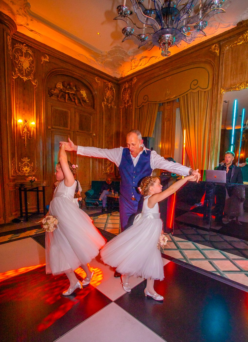 wedding-photograph-claridges-groom-daughters-dancing-reception.jpg
