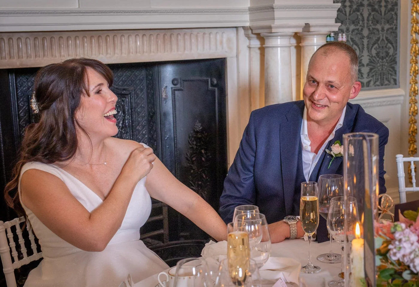 wedding-photograph-claridges-couple-laughing-reception.jpg