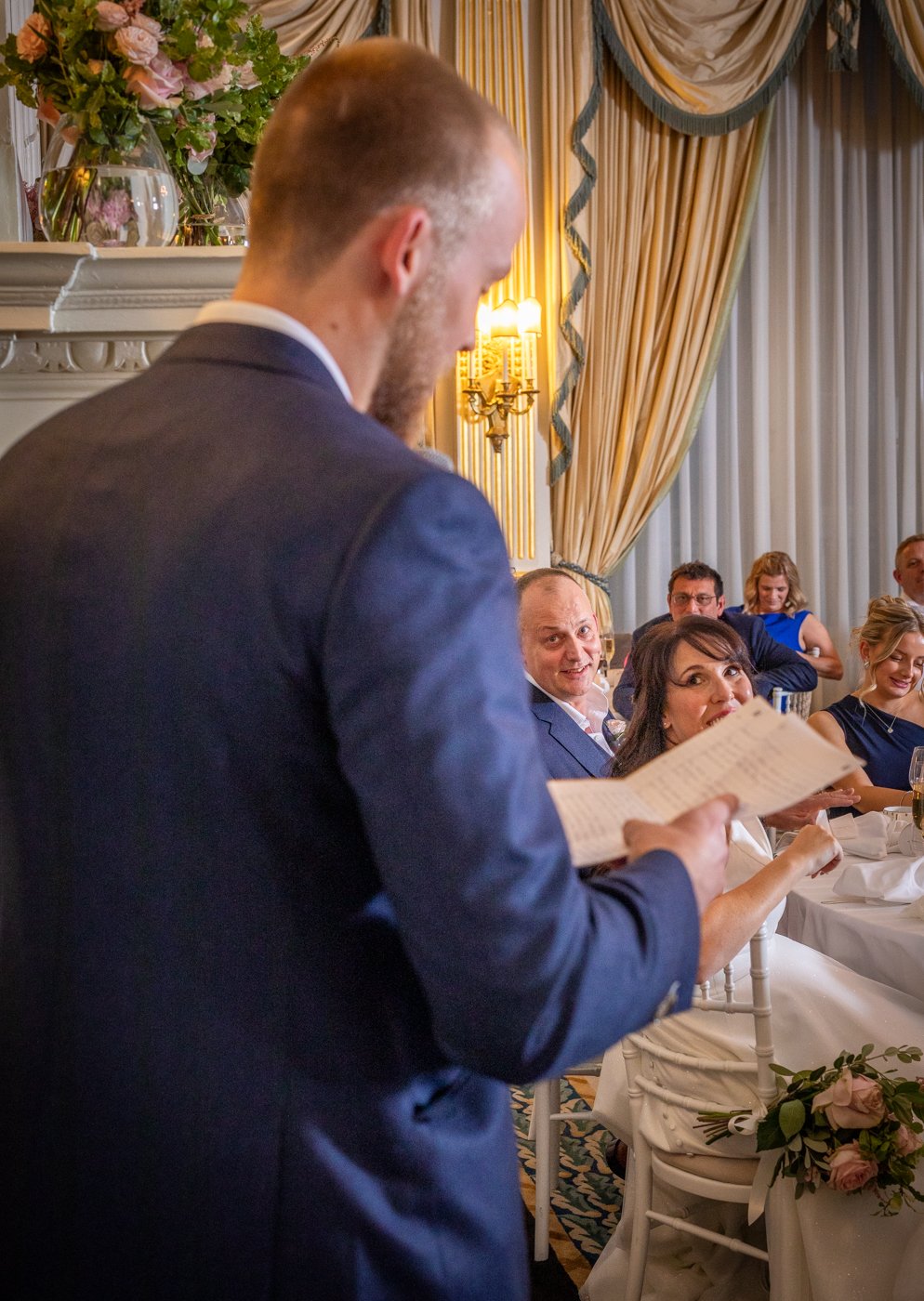 wedding-photograph-claridges-best-man-reading-speech.jpg