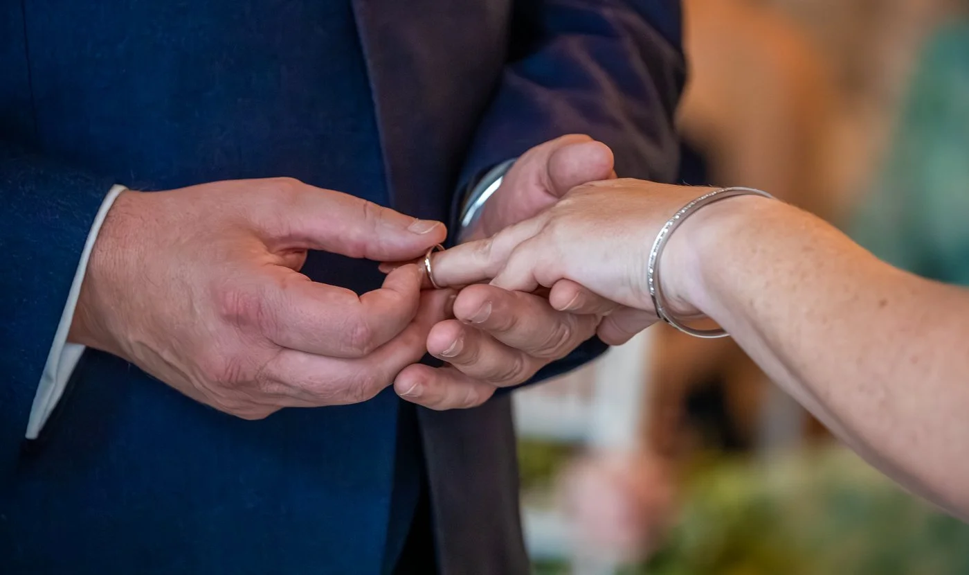 wedding-photograph-claridges-wedding-rings-exchange-closeup.jpg