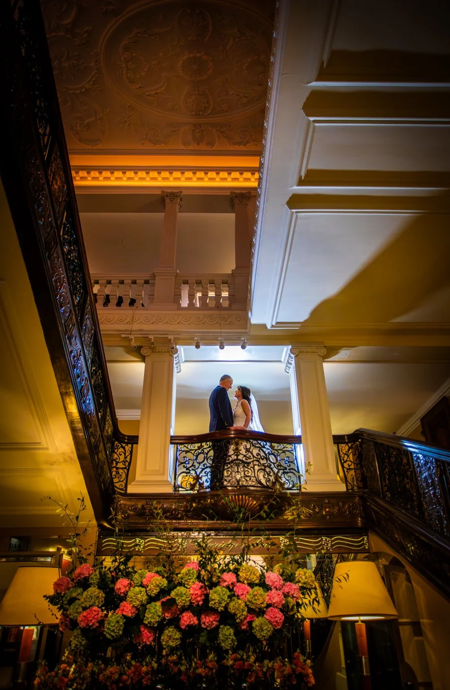 wedding-photograph-claridges-staircase-balcony-perspective.jpg
