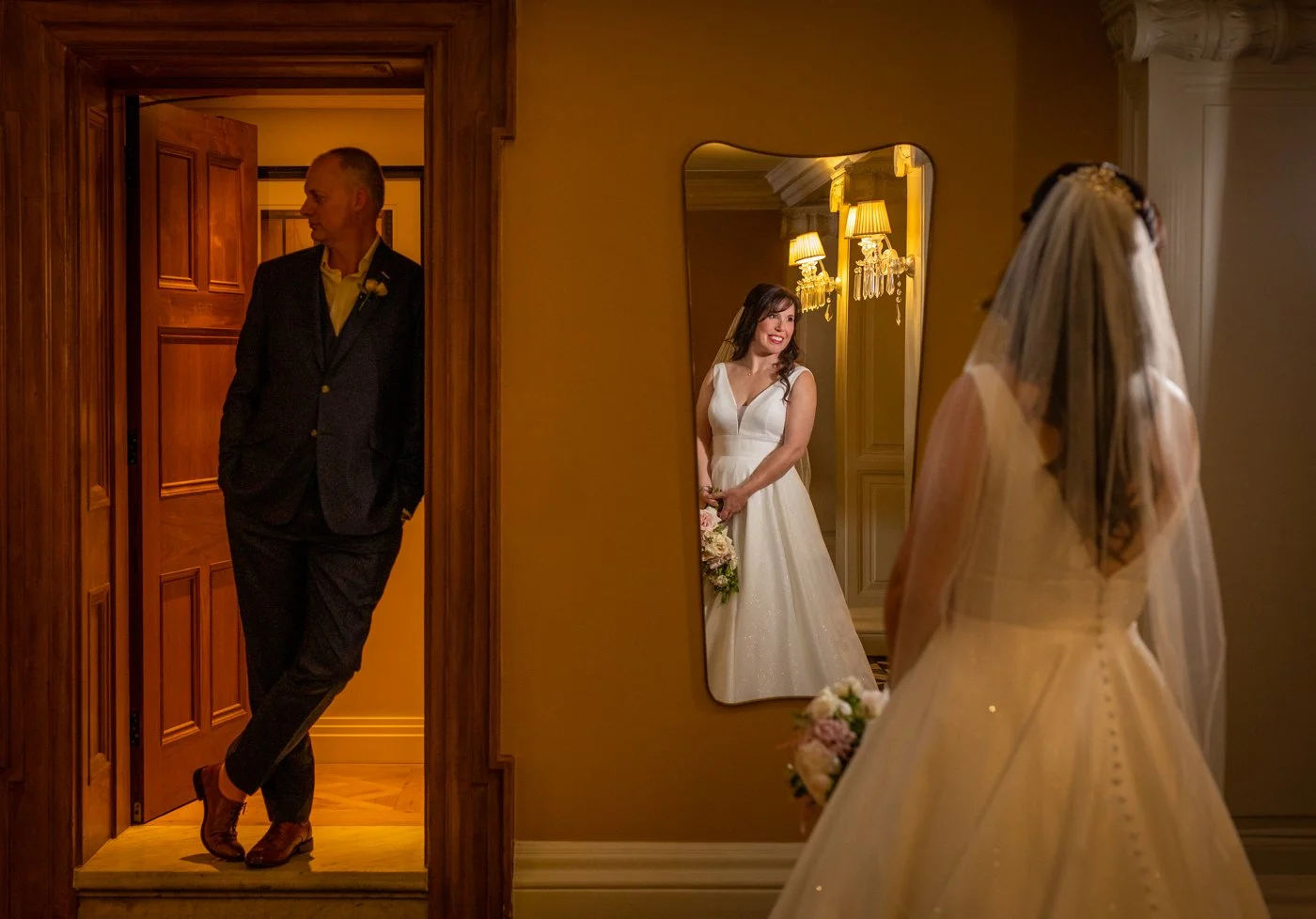 wedding-photograph-claridges-first-look-hotel-corridor.jpg