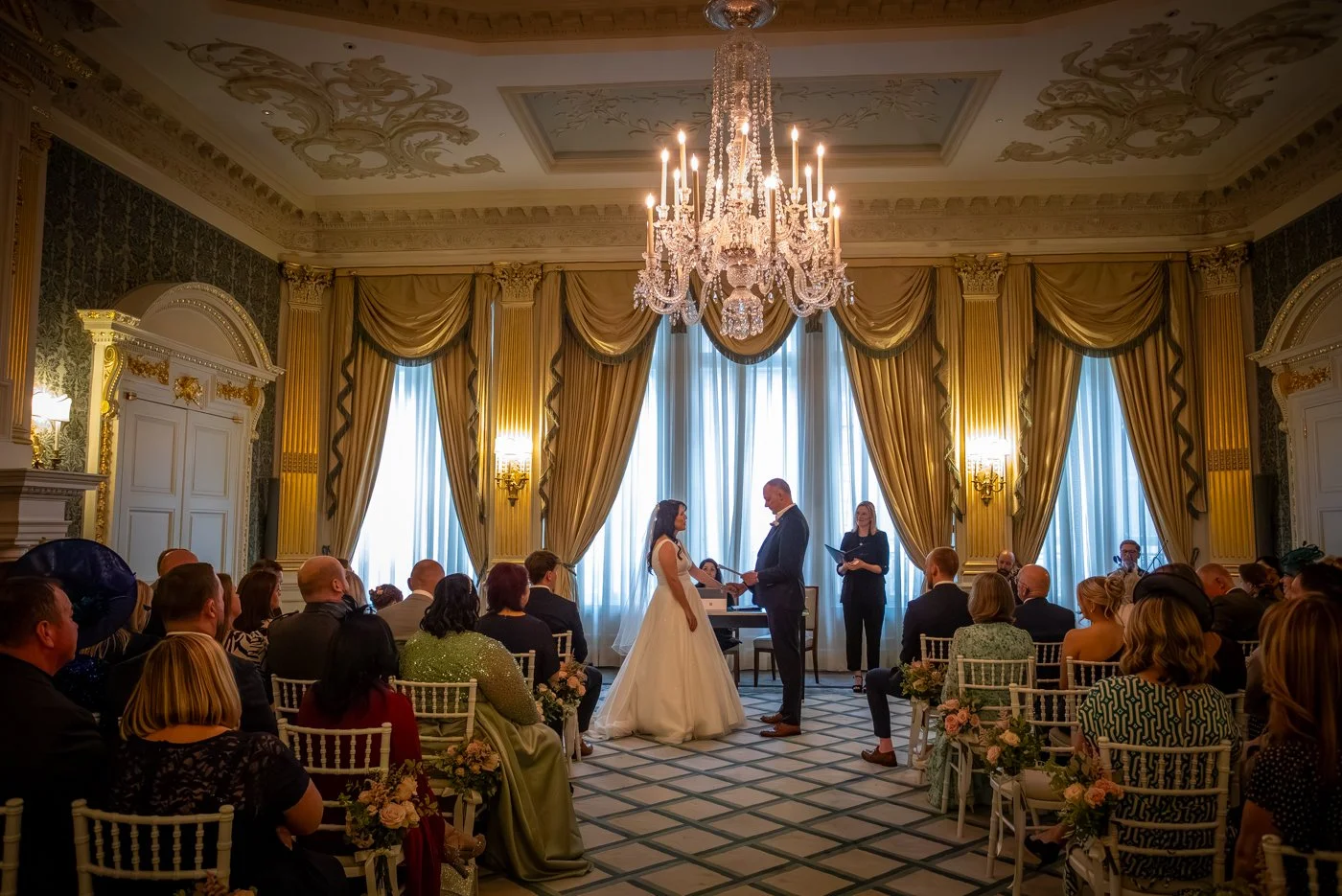 wedding-photograph-claridges-ceremony-chandelier-full-room.jpg