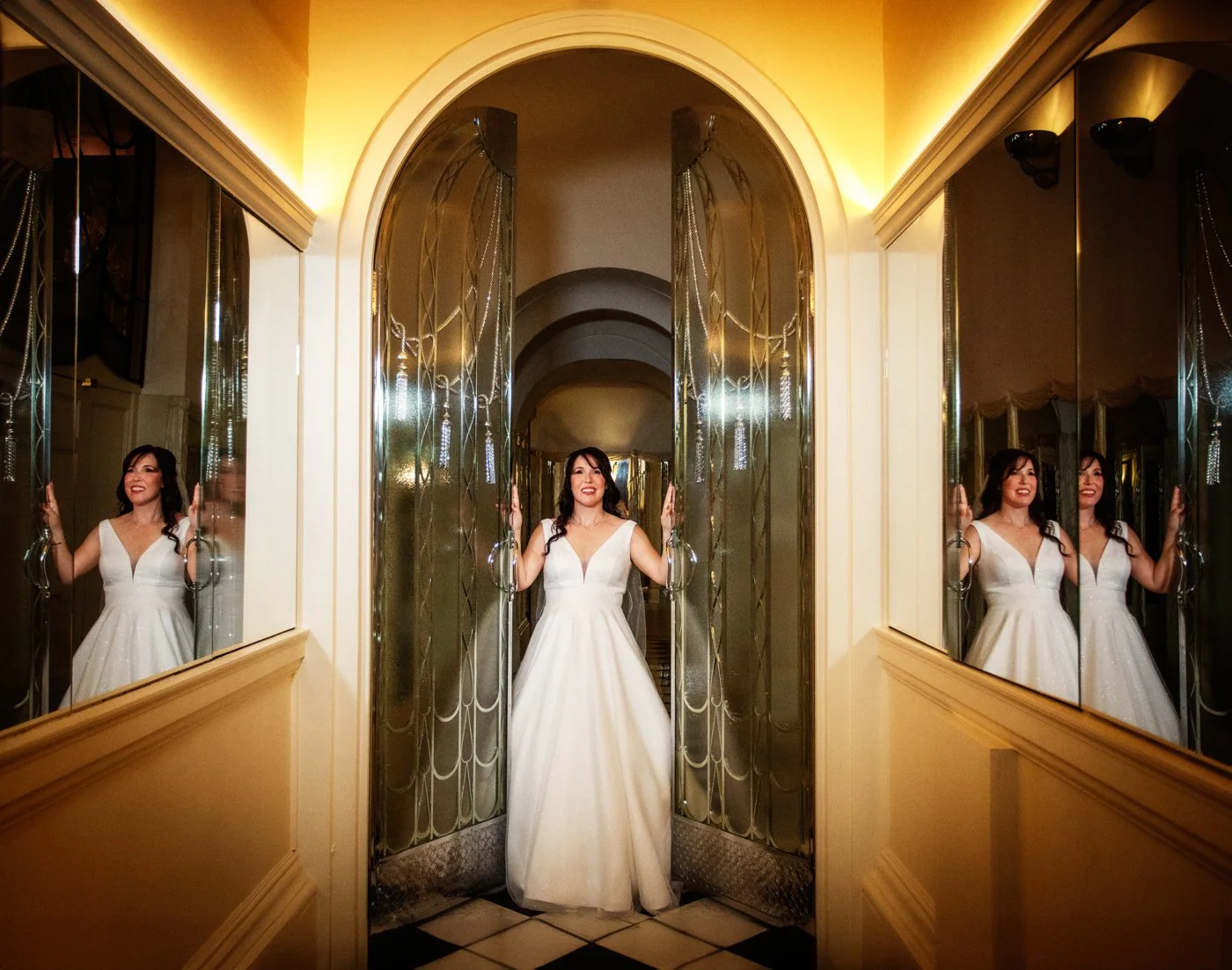 wedding-photograph-claridges-bride-elegant-mirrors-reflection.jpg