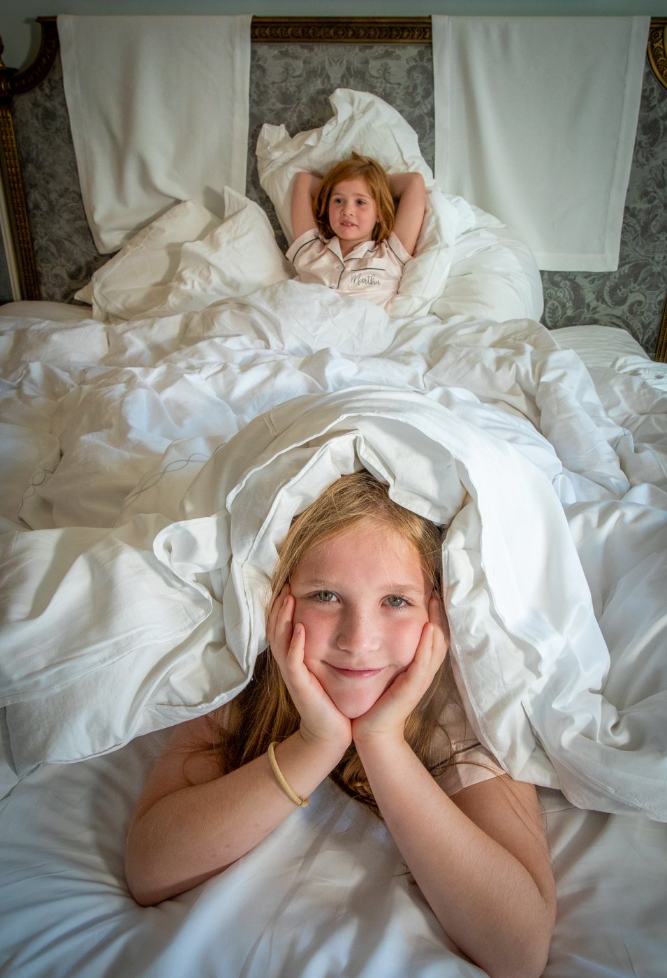 wedding-photograph-claridges-children-in-bed.jpg