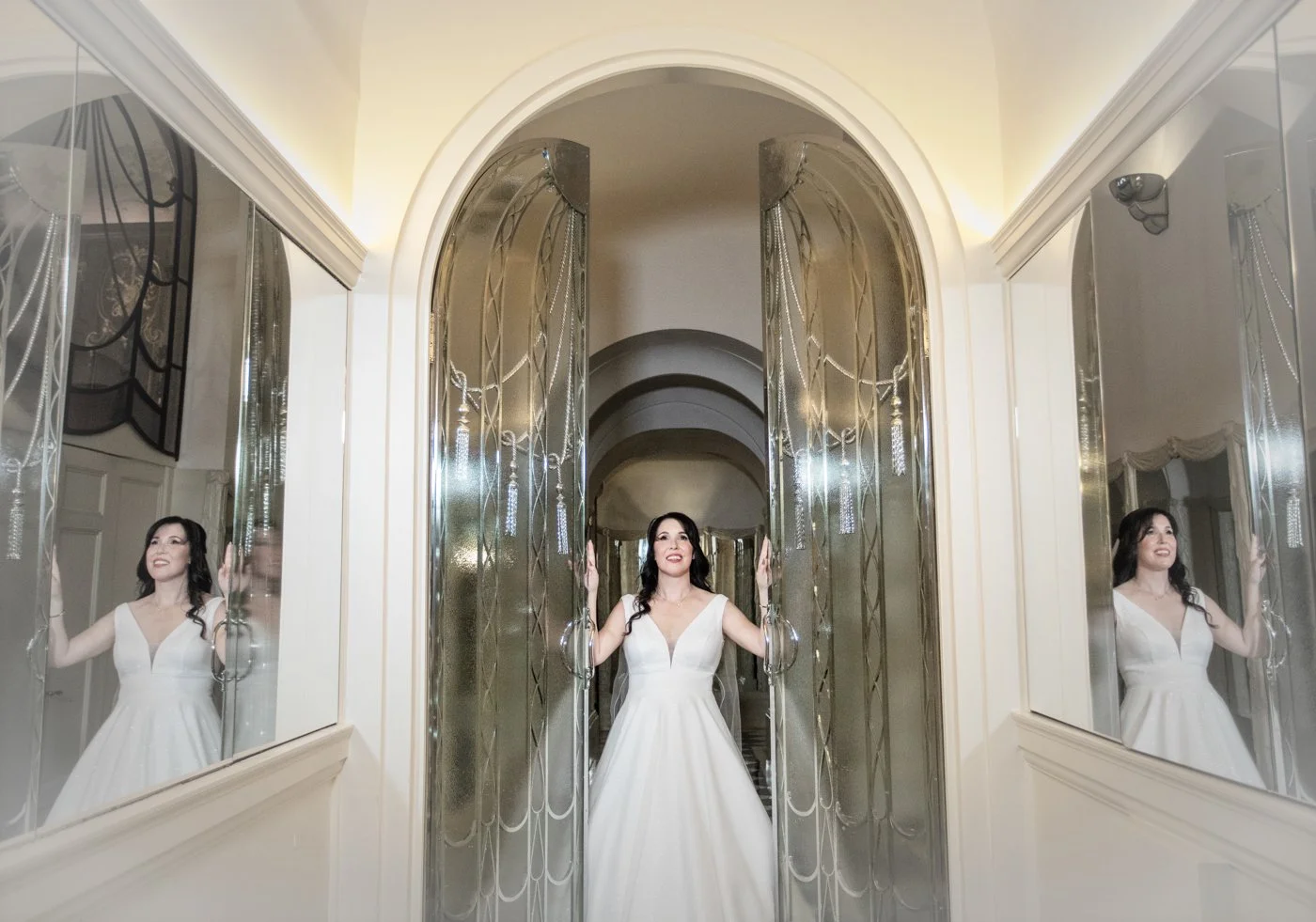 wedding-photograph-claridges-bride-art-deco-mirrors.jpg