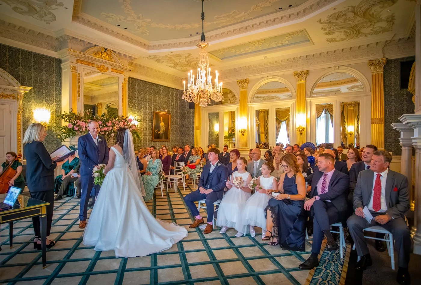 wedding-photograph-claridges-ceremony-walking-aisle.jpg