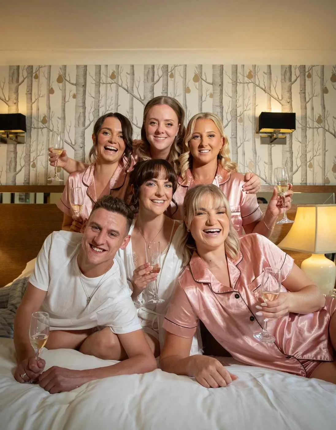bridal party getting ready in a hotel suite