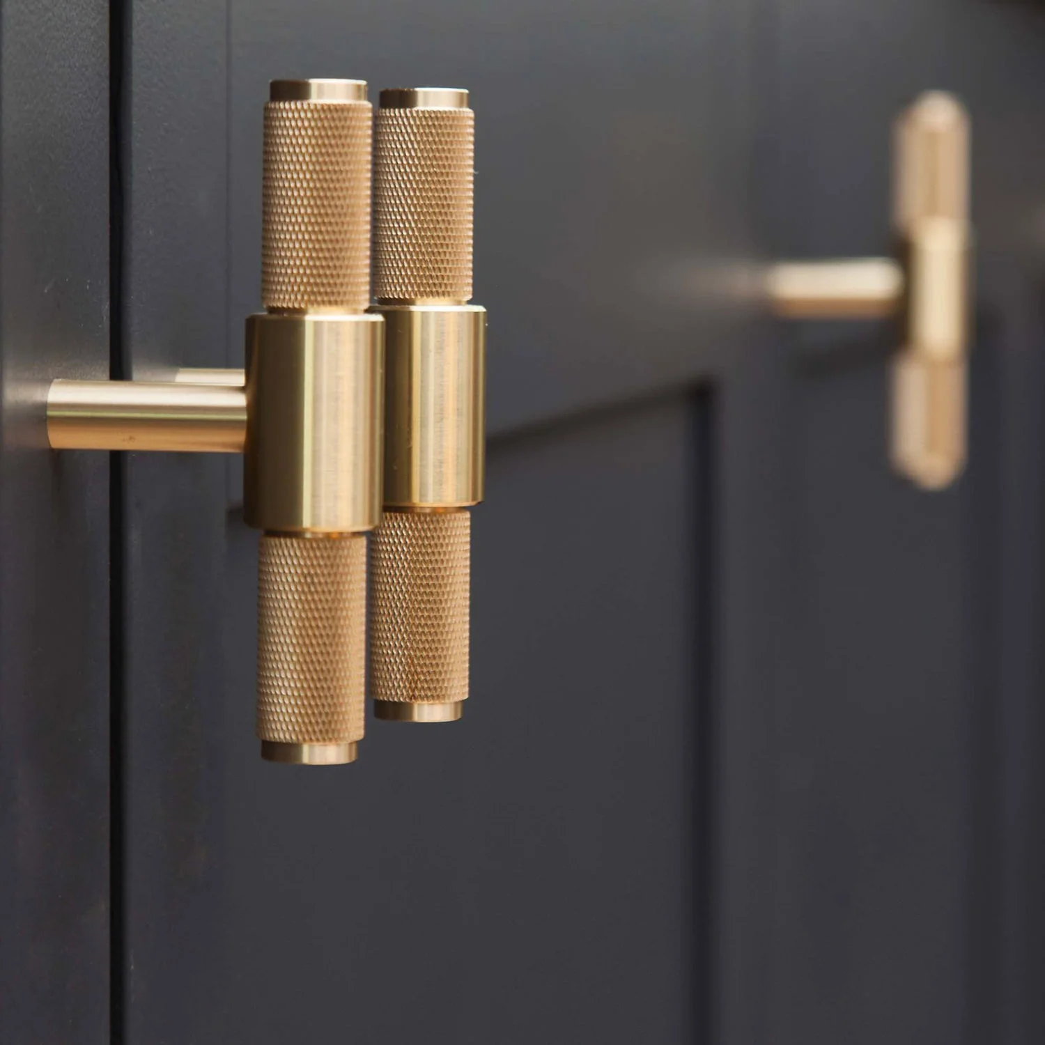 buster-_-punch_t-bar_brass_handles_in_the_pink_house_kitchen_4.jpg