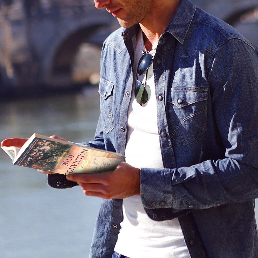 Man reading Wild Convicton.jpeg