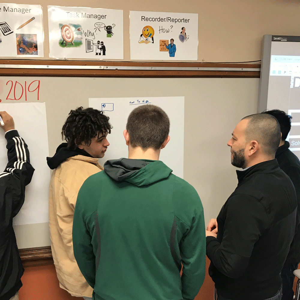 Salem-Keizer students brainstorm with an OMESC volunteer