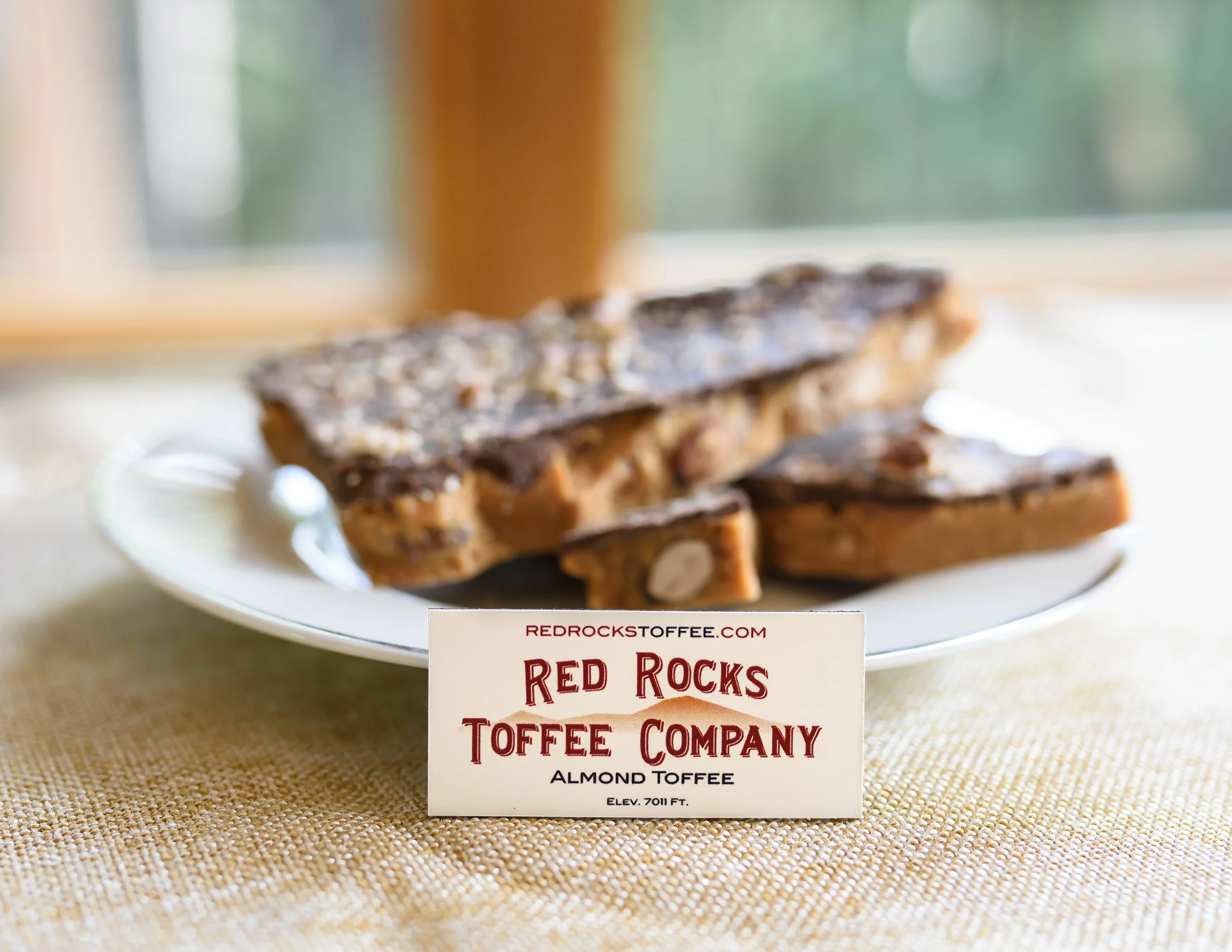 Toffee on Plate with Company Sign .jpg