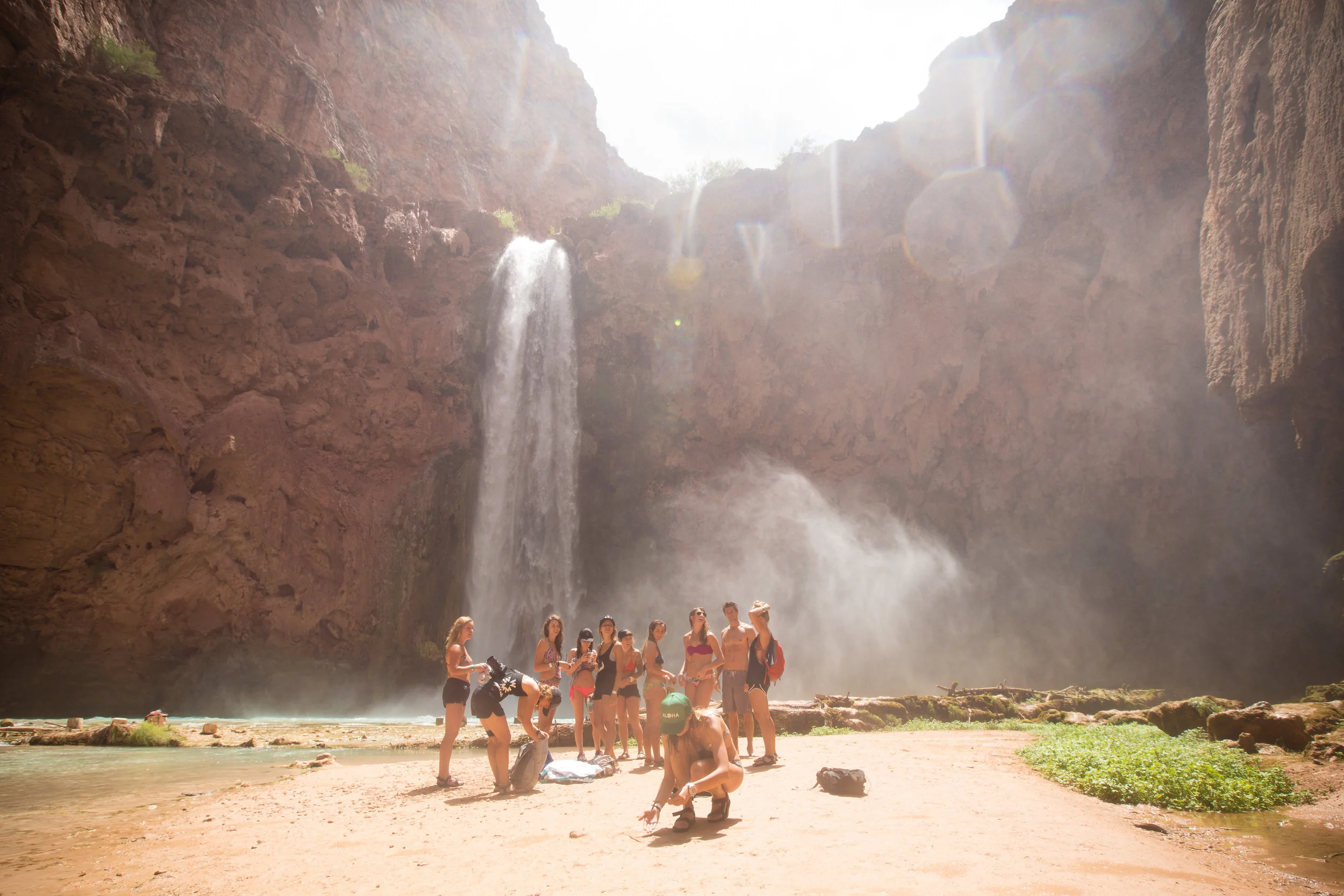 Too busy catching bugs to notice the group meeting or the massive waterfall behind me.