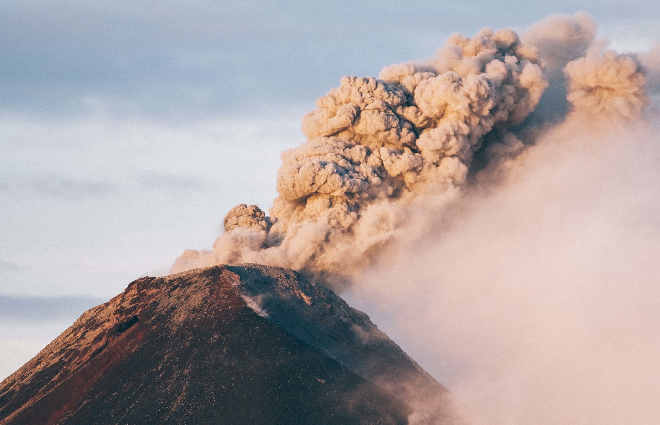 Fuego erupting at sunrise. Photo by John Guillote.