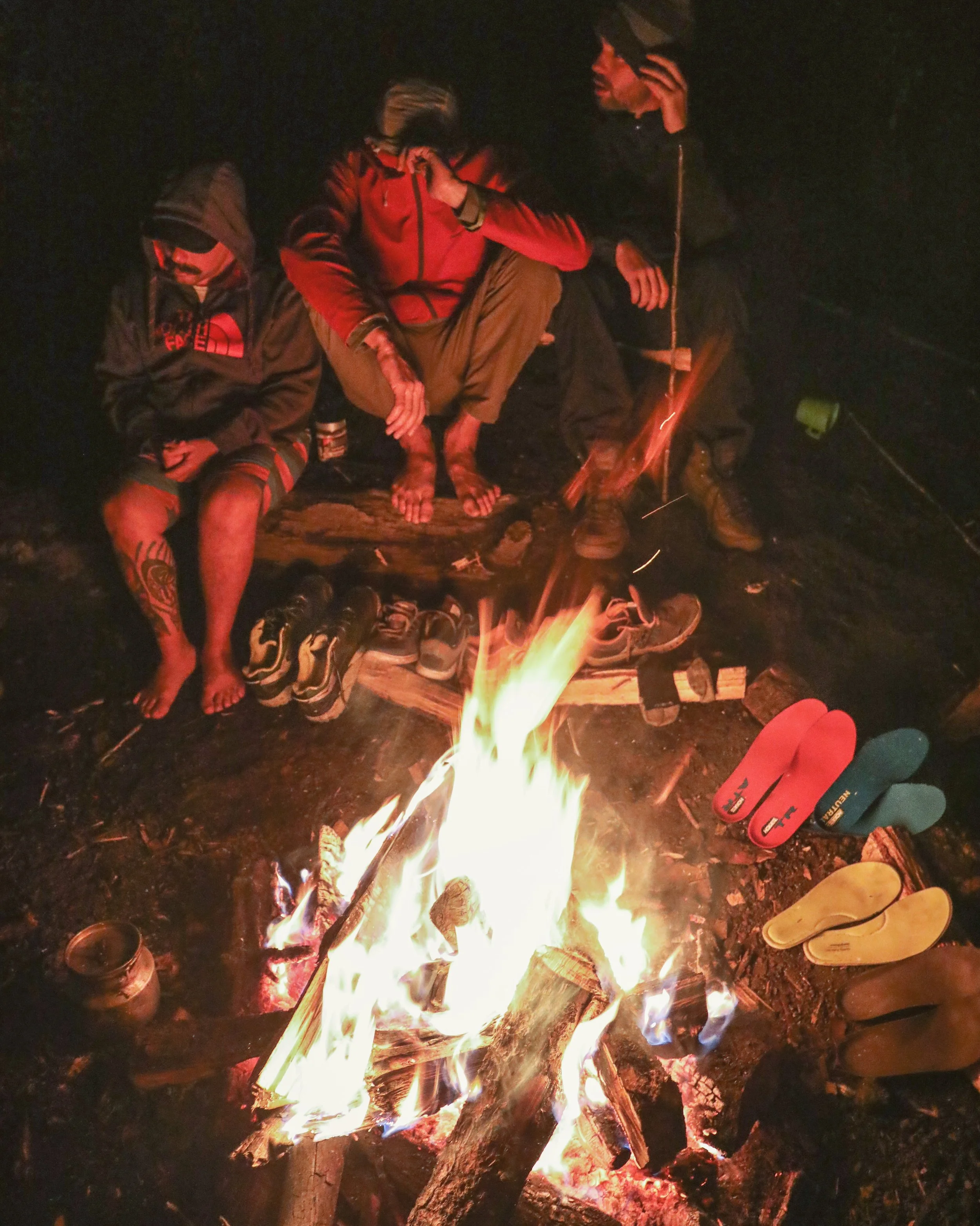 Warming up our frozen toes and drying out wet soles after a long hike up in the freezing rain.