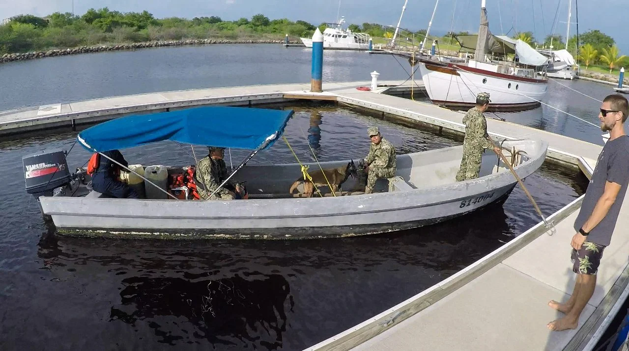 Shortly after arriving in the marina Customs, Immigration and Navy officers, as well as their drug sniffing dog came to inspect Agape.