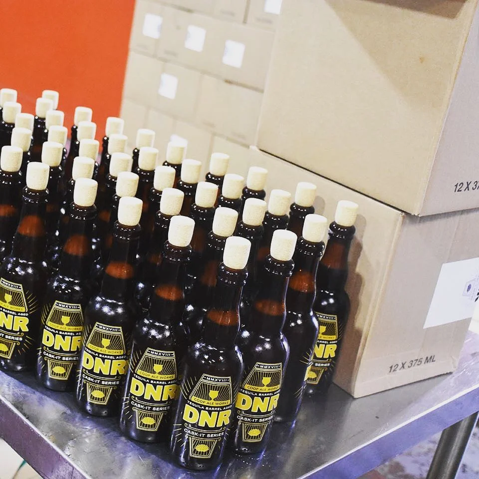 COOP Ale Works DNR CaskIt Series Bottle Design — Robot House