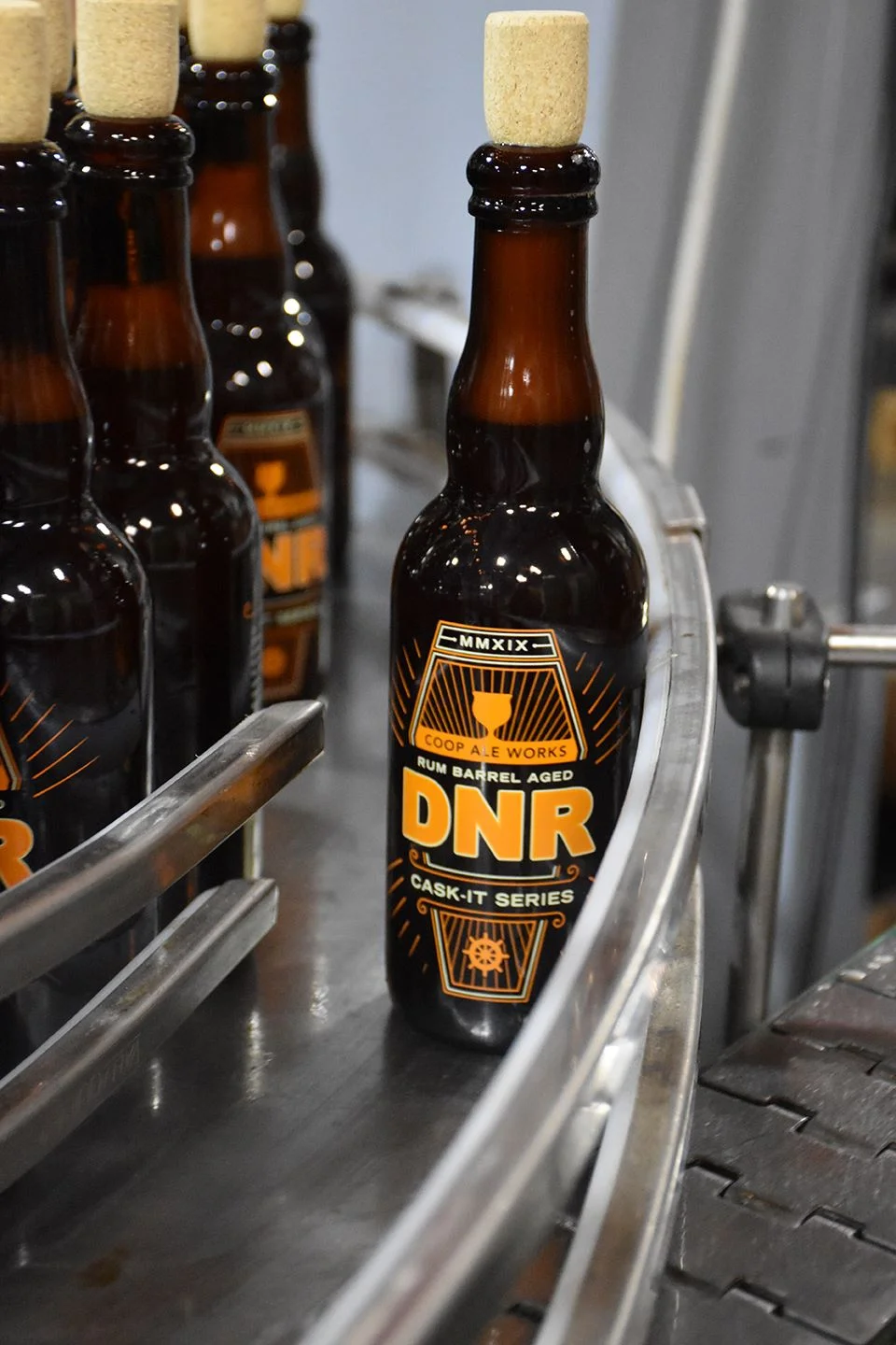 COOP Ale Works DNR CaskIt Series Bottle Design — Robot House