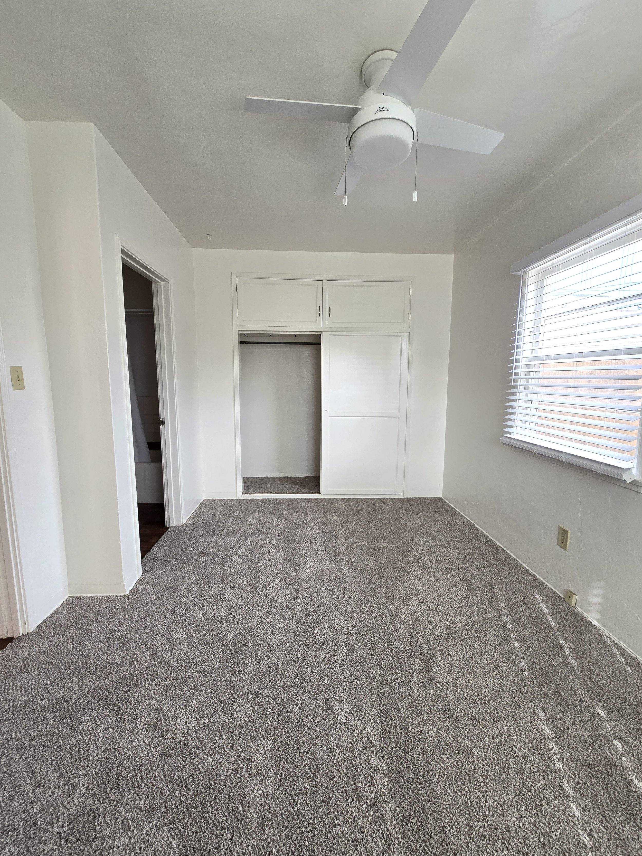 724 Emreald Bedroom w: closet open.jpg